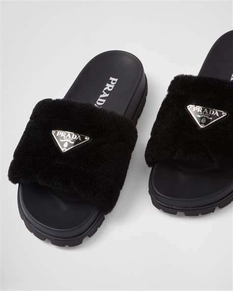 prada furry slippers|Prada fluffy slides.